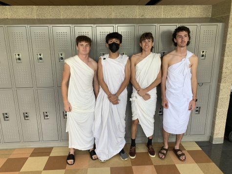 Picture taken by Mark Lenzini, CCHS students (from left to right) William Skiles, Timothy Lin, Matthew Nadolski, and Cameron Tabor pose for a picture in their togas.