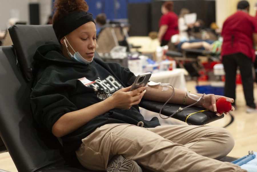 Truth Marsh, one of Butler’s students, donates blood in Carbondale Community High School’s 2022 Spring Blood Drive.      Picture Credit: Beth Davis. 

