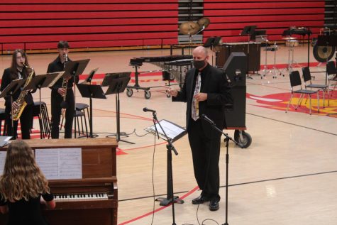 Picture taken by Ethan Feloni. Band director Gregory Townsend guiding one of his jazz groups at Organizational contests
