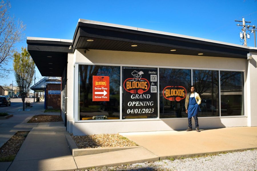 Photo Taken By: Joslyn Woods. Alaye Graham stands in front of newly opened business, Blockos