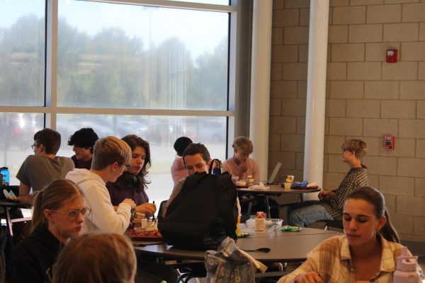 The students at Carbondale Community High School conversations as they eat lunch.
