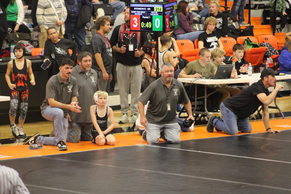 Carbondale Middle School Head Coach Dwane Parks coaching his wrestlers